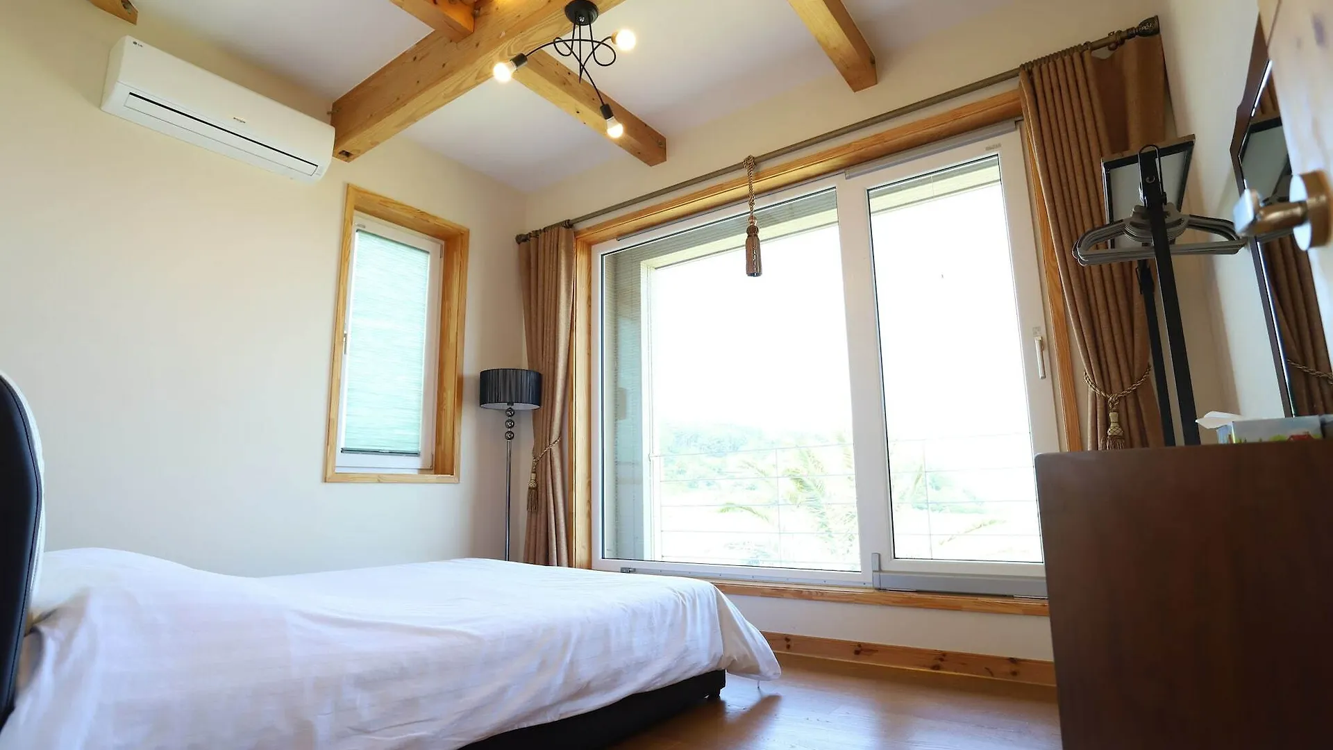 Jeju Lake Pension Casa de Férias